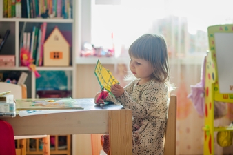A girl works on Art as part of an art therapy program